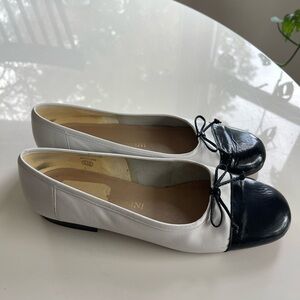Chic Vintage Black and White Flats with Bow Detail